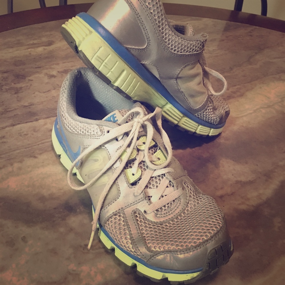grey, blue and green youth Nike workout shoes